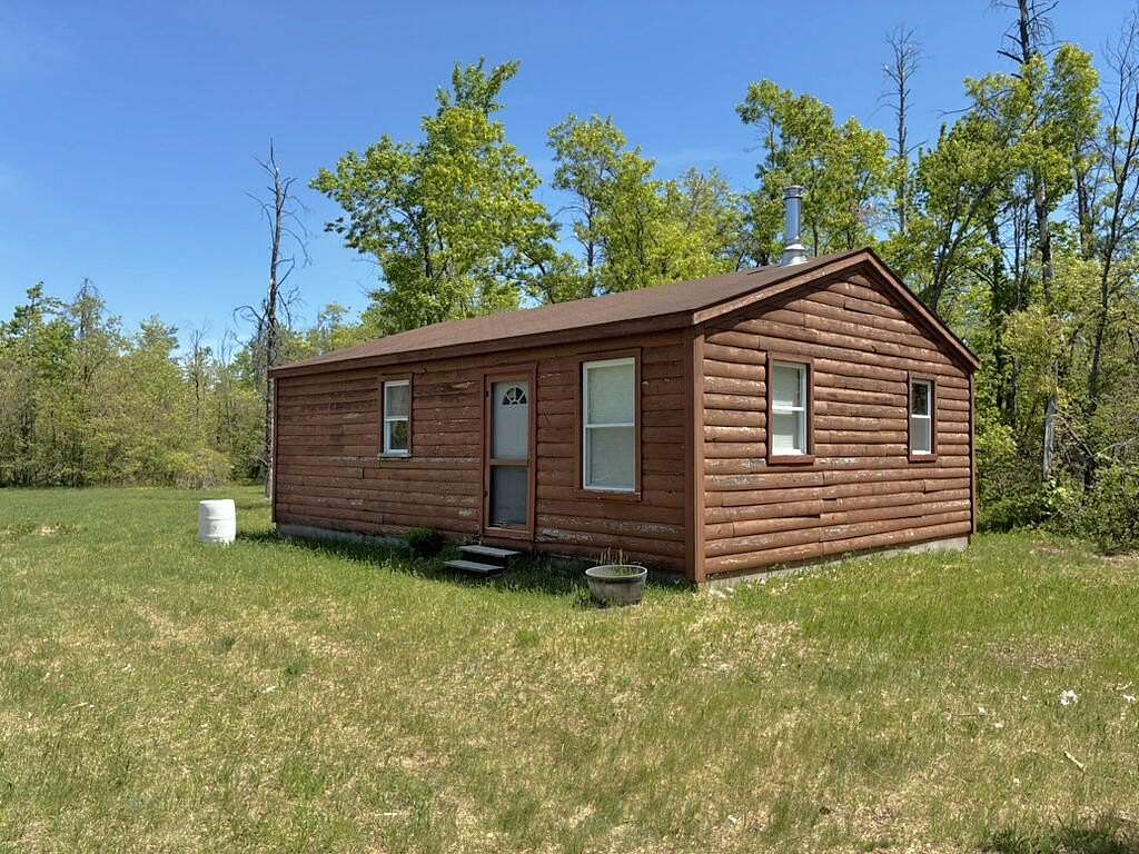 5 Acres of Land with Home for Sale in Lewiston, Michigan