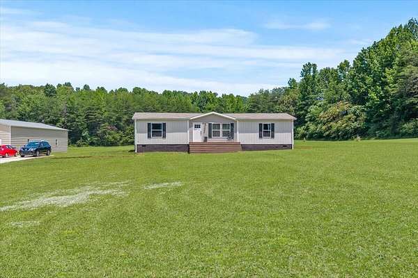 6 Acres of Land with Home for Sale in Athens, Tennessee