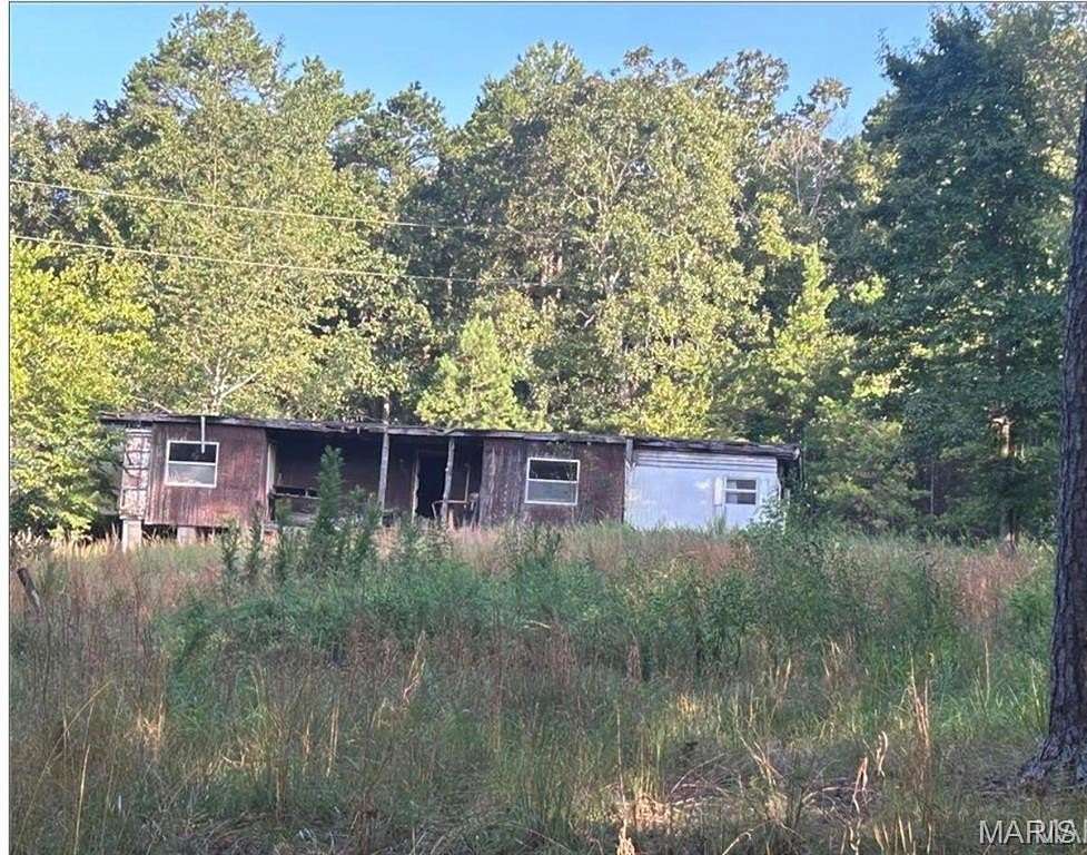 9.6 Acres of Improved Residential Land for Sale in Poplar Bluff, Missouri