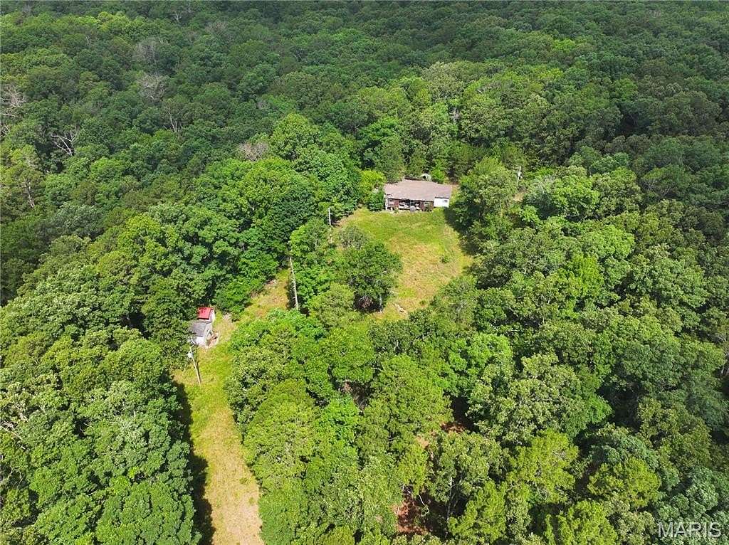 9.6 Acres of Improved Residential Land for Sale in Poplar Bluff, Missouri