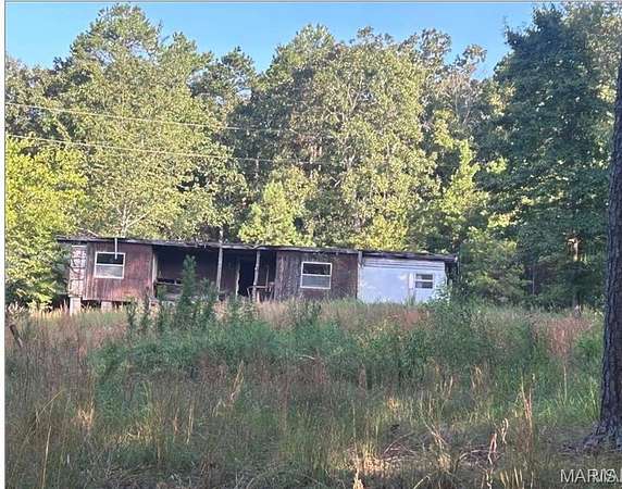 9.6 Acres of Improved Residential Land for Sale in Poplar Bluff, Missouri