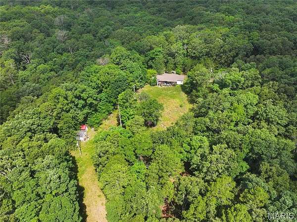 9.6 Acres of Improved Residential Land for Sale in Poplar Bluff, Missouri