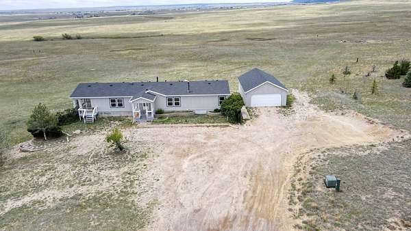 37.6 Acres of Land with Home for Sale in Peyton, Colorado