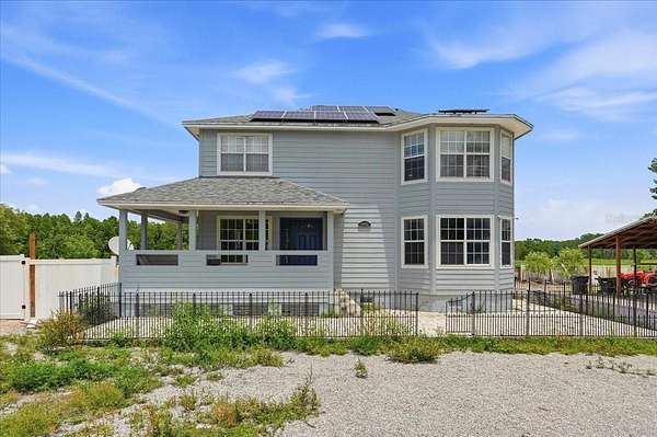 4.64 Acres of Land with Home for Sale in Polk City, Florida