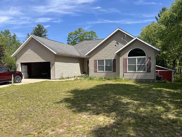 4.8 Acres of Land with Home for Sale in Twin Lake, Michigan