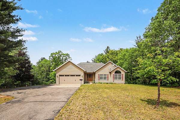 4.8 Acres of Land with Home for Sale in Twin Lake, Michigan