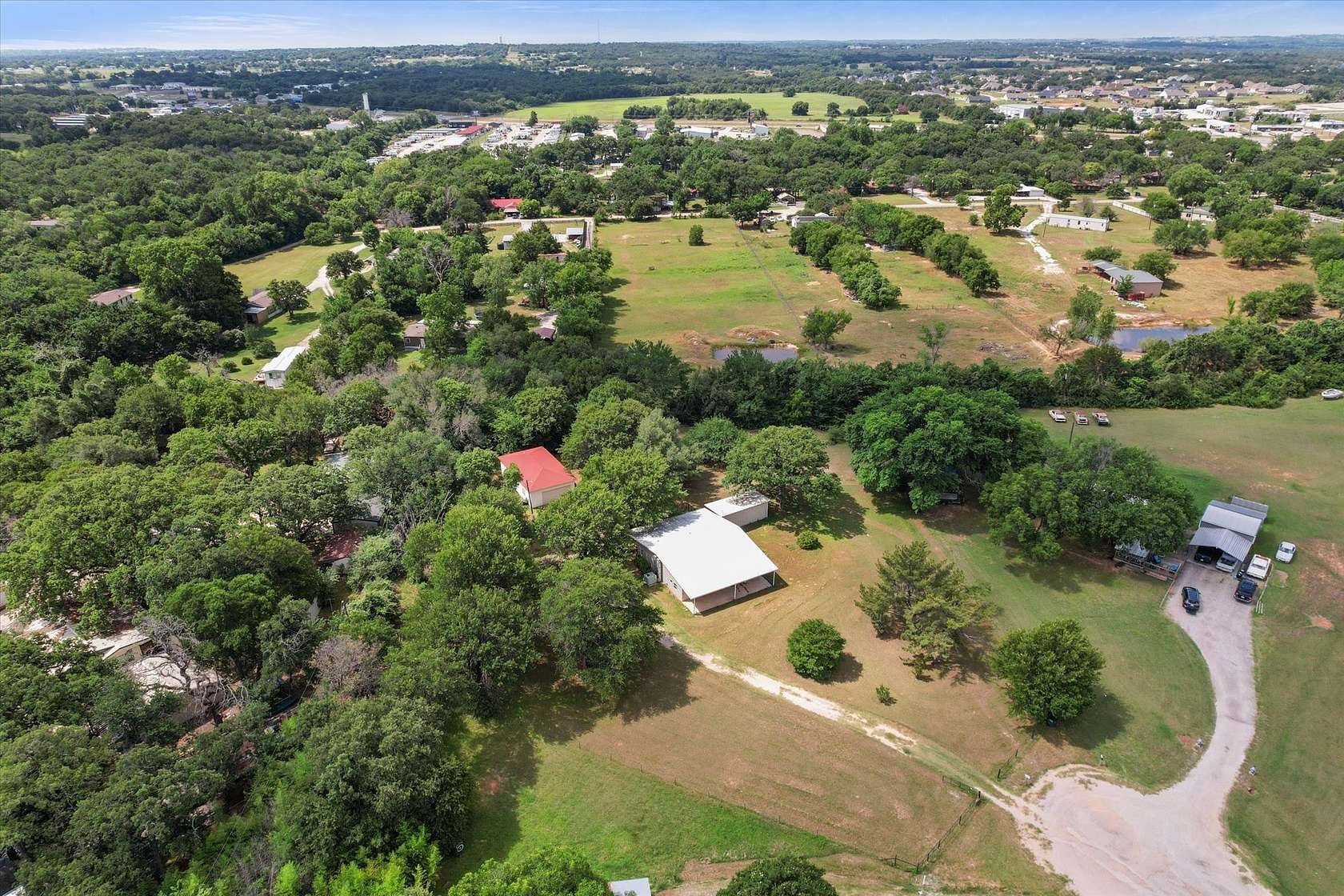 1.67 Acres of Land with Home for Sale in Springtown, Texas