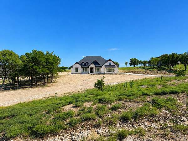 2 Acres of Land with Home for Sale in Weatherford, Texas