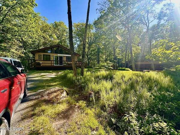 50 Acres of Land with Home for Sale in Hawley, Pennsylvania