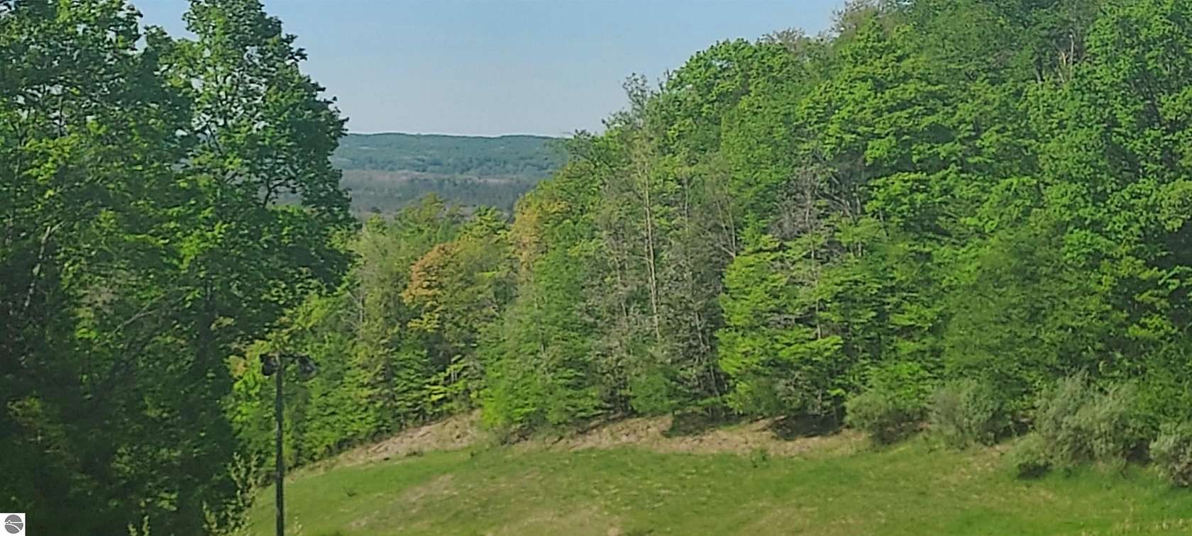 0.93 Acres of Residential Land for Sale in Bellaire, Michigan