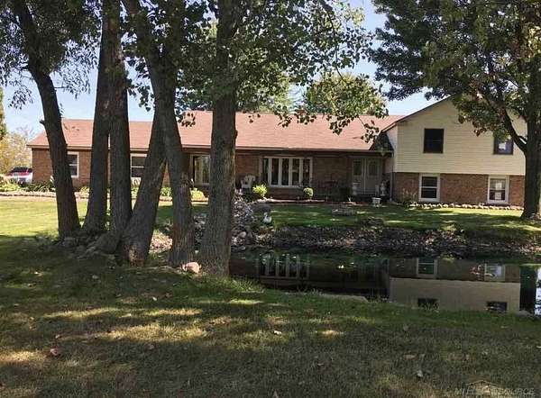2.89 Acres of Land with Home for Sale in Allenton, Michigan