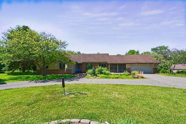 4 Acres of Land with Home for Sale in Ada, Michigan