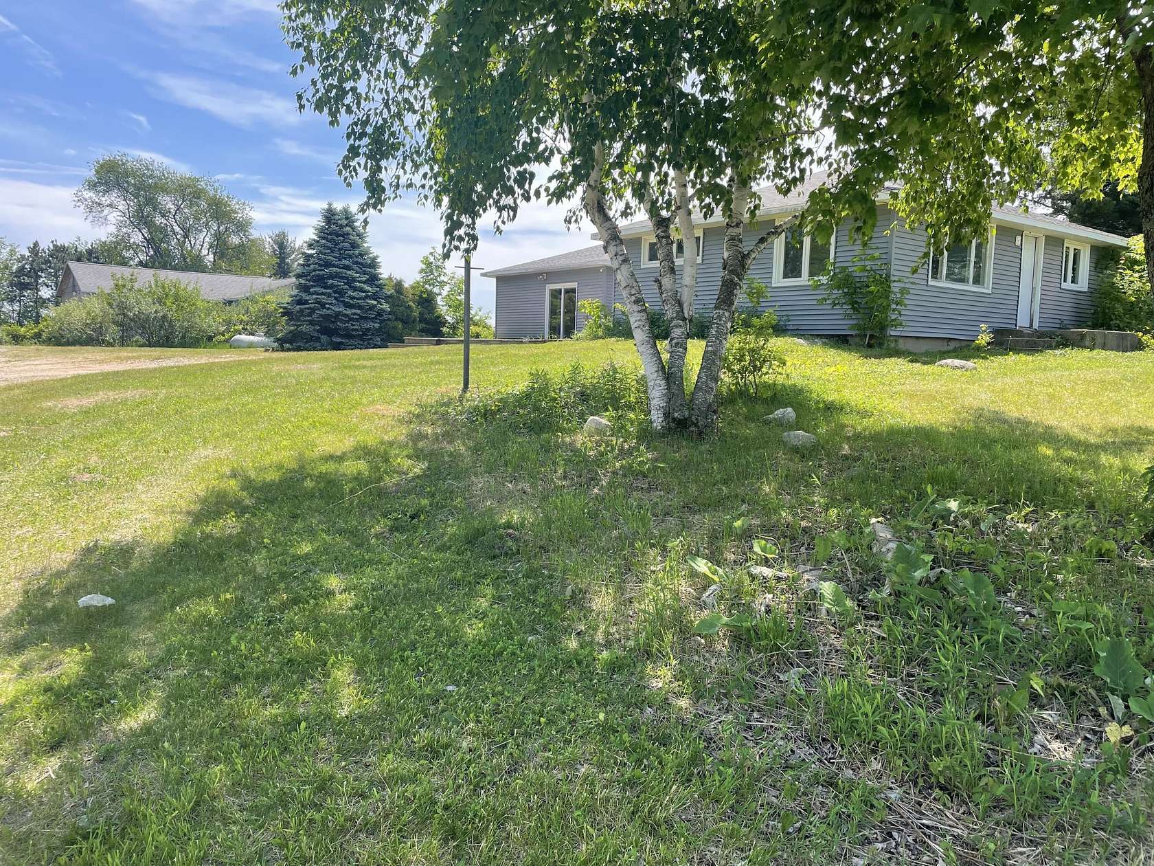 3 Acres of Land with Home for Sale in Fremont, Michigan