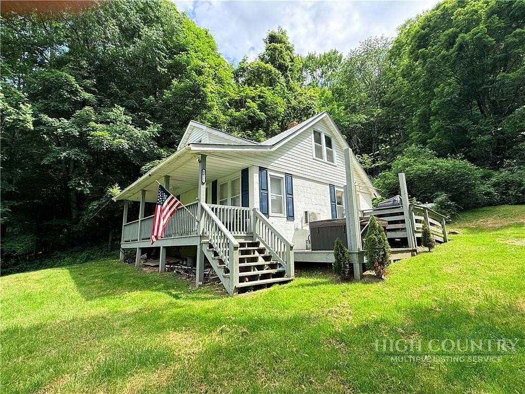 4.76 Acres of Land with Home for Sale in Lansing, North Carolina