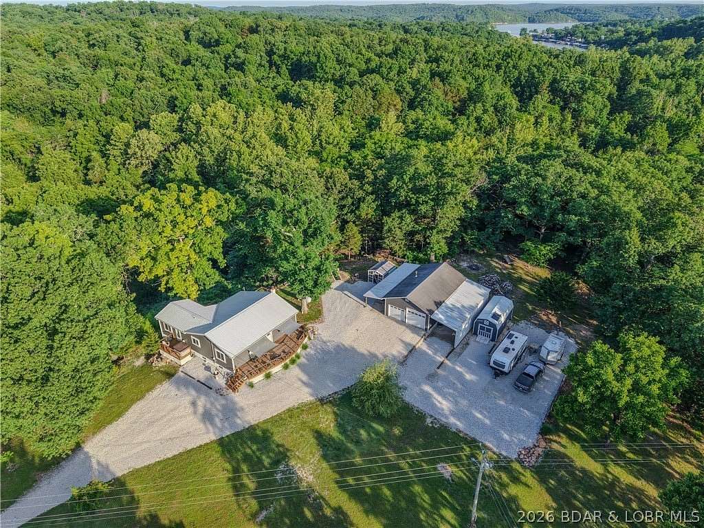 3 Acres of Land with Home for Sale in Gravois Mills, Missouri