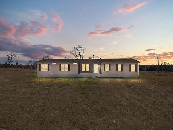 5 Acres of Land with Home for Sale in Gilmer, Texas