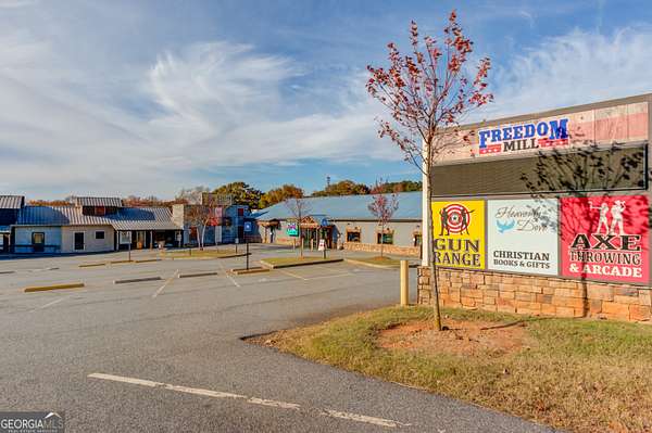 3.22 Acres of Improved Commercial Land for Sale in Cumming, Georgia