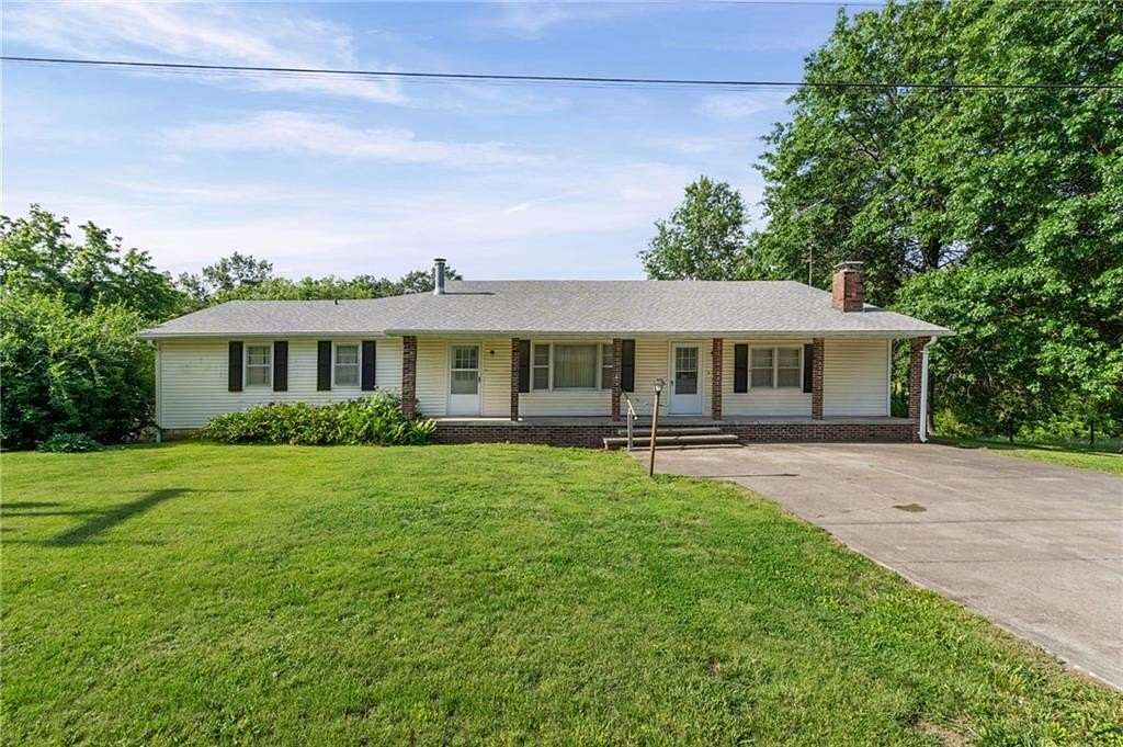 8.29 Acres of Land with Home for Sale in Gower, Missouri