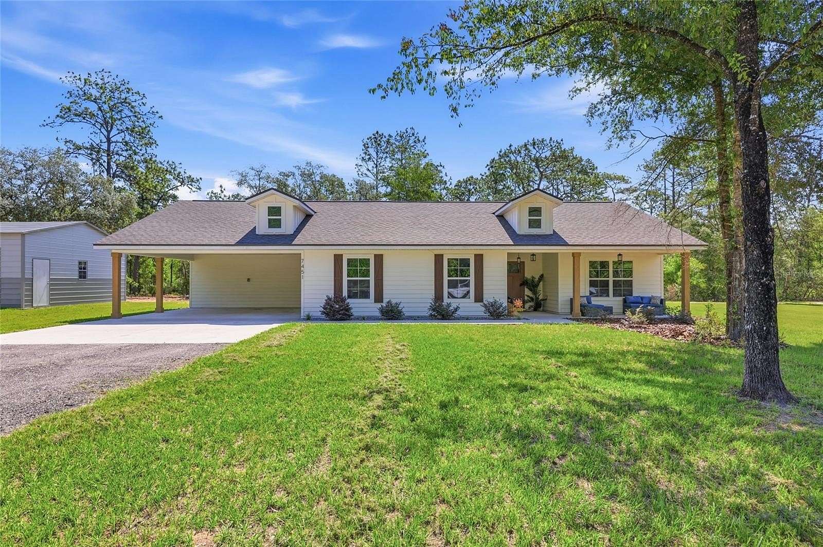4.39 Acres of Land with Home for Sale in Williston, Florida