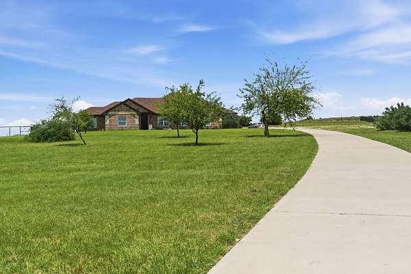 2.47 Acres of Land with Home for Sale in Springtown, Texas