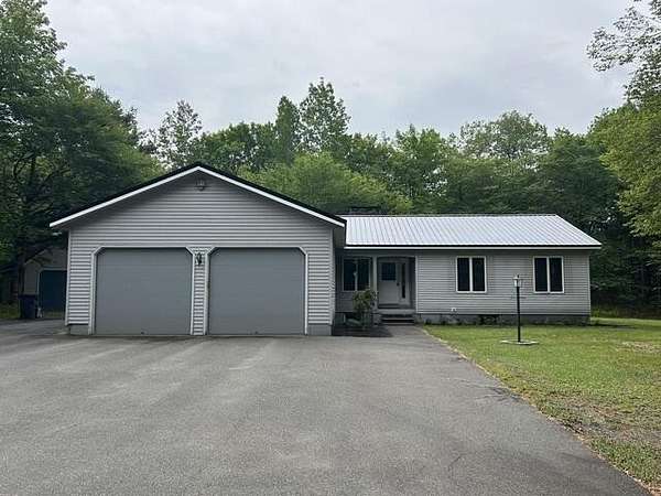 9.73 Acres of Land with Home for Sale in Milo, Maine