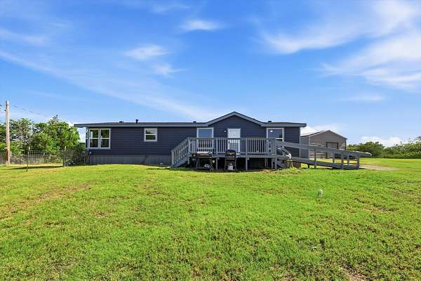5 Acres of Land with Home for Sale in Springtown, Texas