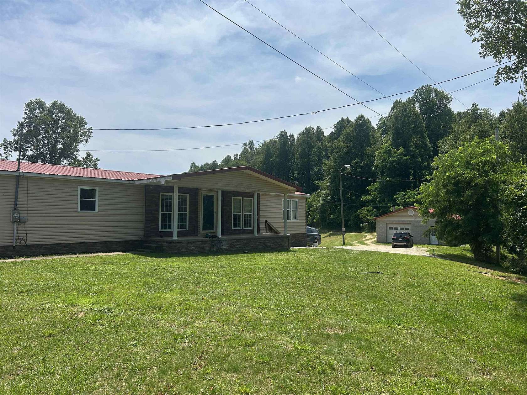 5 Acres of Land with Home for Sale in Genoa, West Virginia
