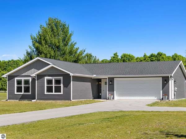 2.5 Acres of Land with Home for Sale in Interlochen, Michigan