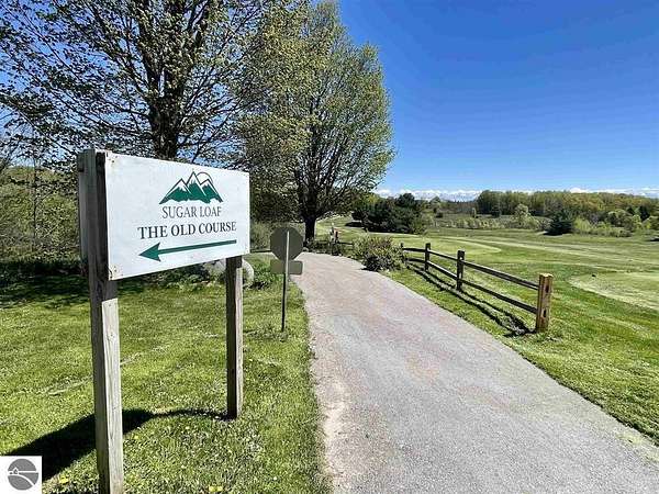 0.7 Acres of Land for Sale in Cedar, Michigan
