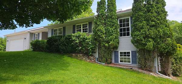 2.5 Acres of Land with Home for Sale in Gowen, Michigan