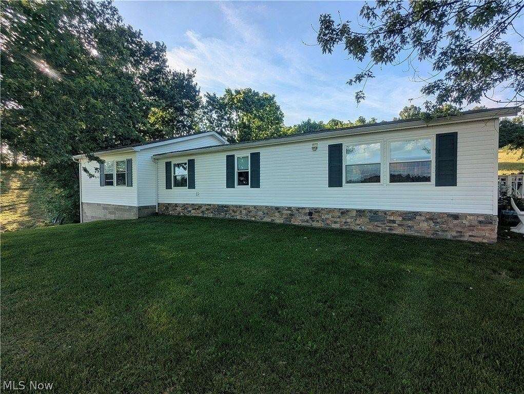4.1 Acres of Land with Home for Sale in Salesville, Ohio