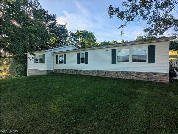 4.1 Acres of Land with Home for Sale in Salesville, Ohio