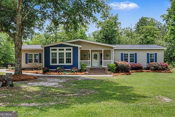 7.67 Acres of Land with Home for Sale in Metter, Georgia