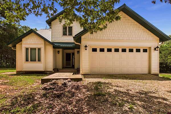 4.57 Acres of Land with Home for Sale in Yellville, Arkansas