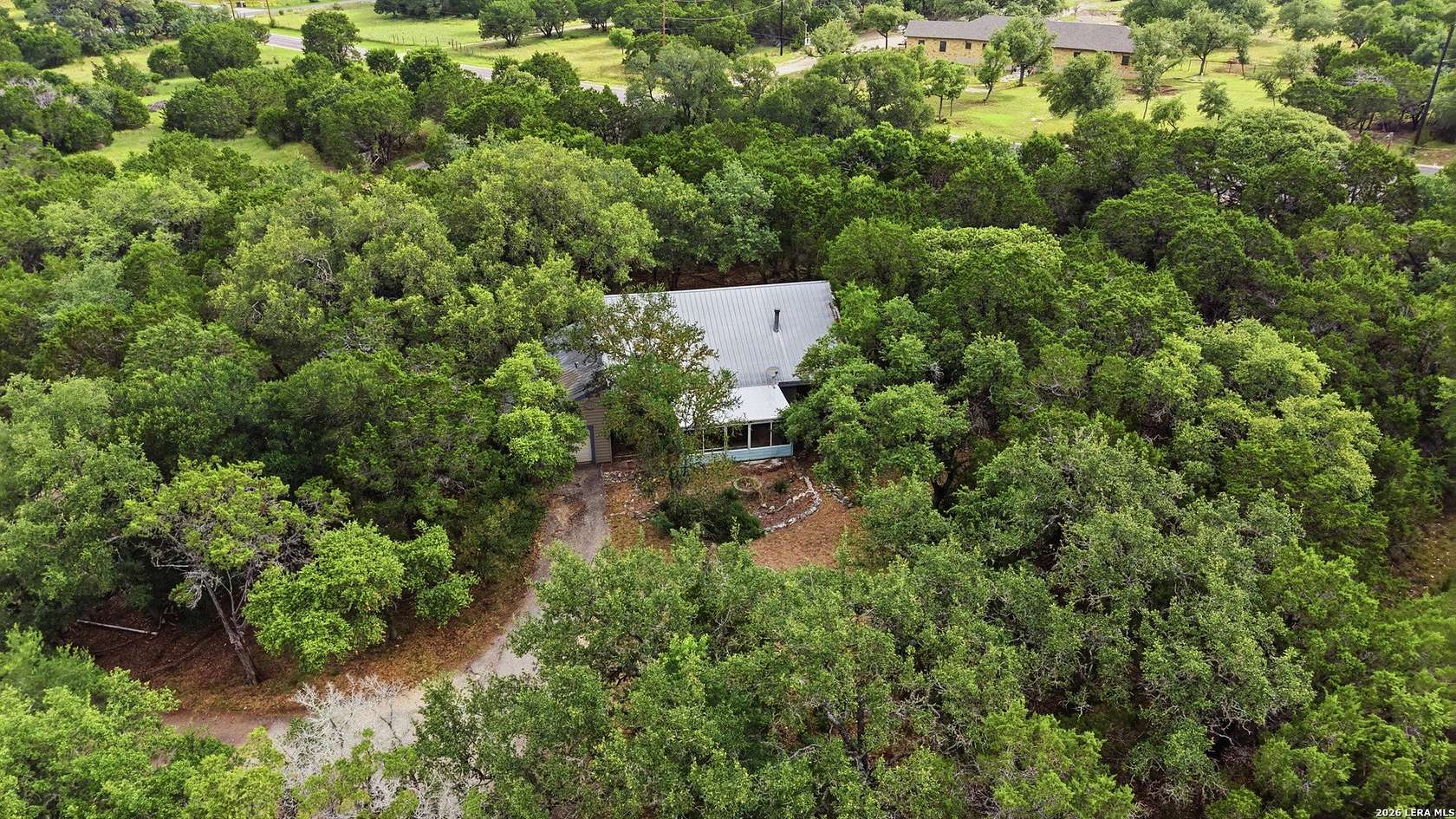 6.3 Acres of Land with Home for Sale in Bulverde, Texas