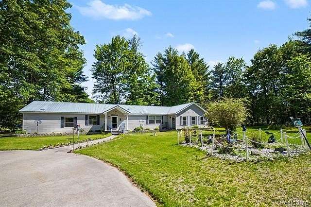 1.5 Acres of Land with Home for Sale in Beaverton Township, Michigan