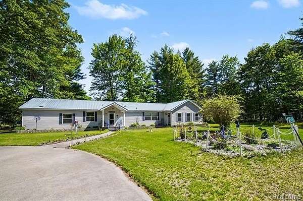 1.5 Acres of Land with Home for Sale in Beaverton Township, Michigan