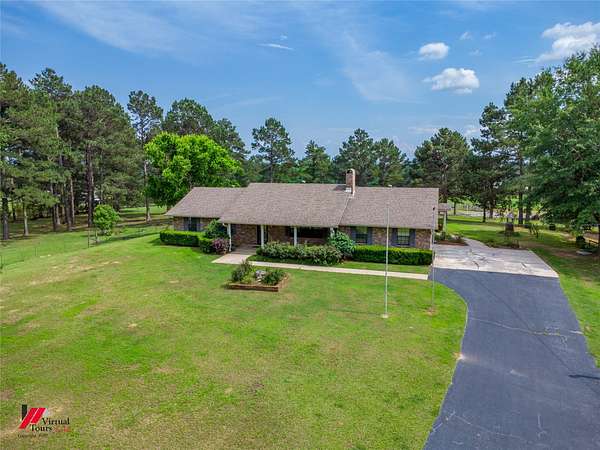 51.9 Acres of Land with Home for Sale in Coushatta, Louisiana