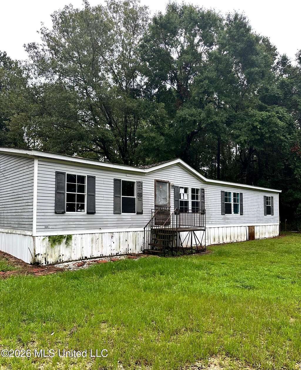 5.9 Acres of Land with Home for Sale in Picayune, Mississippi