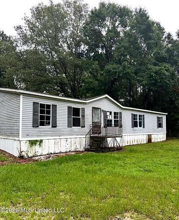 5.9 Acres of Land with Home for Sale in Picayune, Mississippi