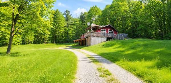 4.83 Acres of Land with Home for Sale in Newfield, New York