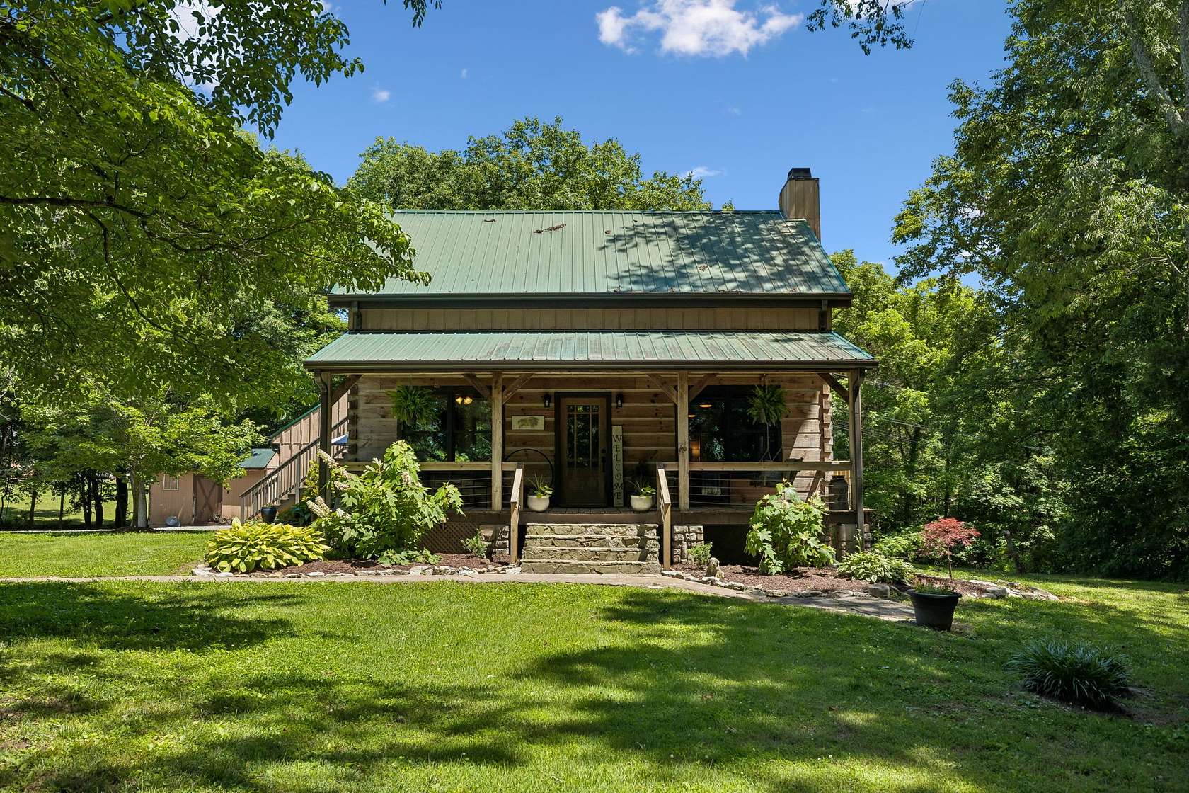1.62 Acres of Land with Home for Sale in Cottontown, Tennessee