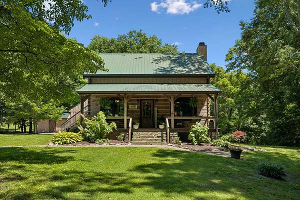 1.62 Acres of Land with Home for Sale in Cottontown, Tennessee