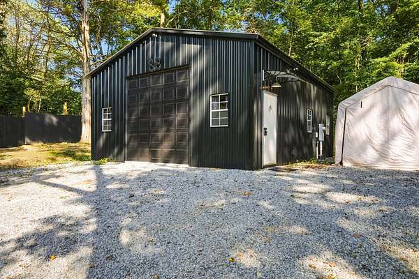 1.54 Acres of Land with Home for Sale in Chapmansboro, Tennessee