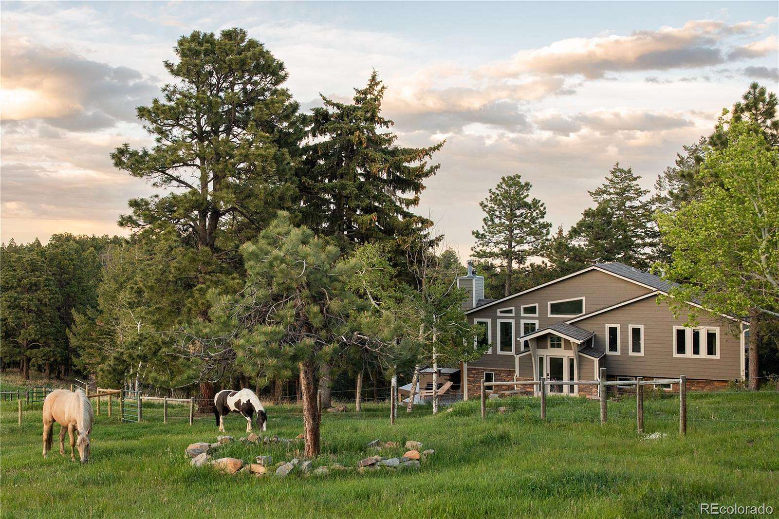 14 Acres of Land with Home for Sale in Evergreen, Colorado
