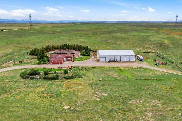 154 Acres of Agricultural Land with Home for Sale in Carr, Colorado
