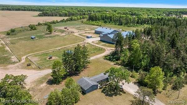 59 Acres of Agricultural Land with Home for Sale in Whitehall Township, Michigan