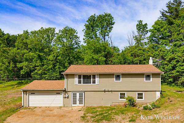 4.12 Acres of Land with Home for Sale in Delton, Michigan