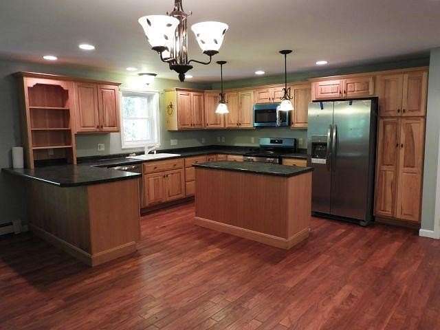 1.65 Acres of Land with Home for Sale in Henniker, New Hampshire