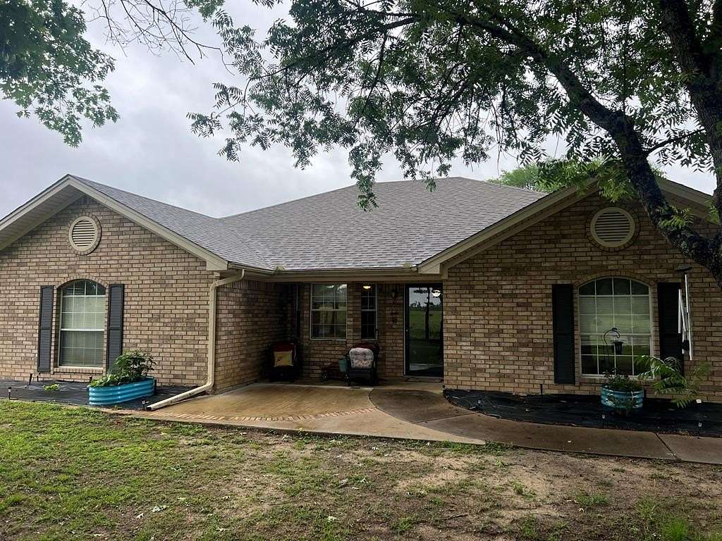 4.86 Acres of Land with Home for Sale in Elkhart, Texas